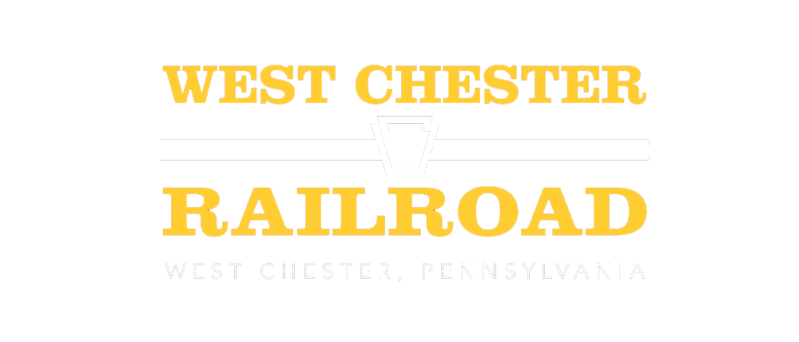 Yellow West Chester Railroad text on white background.
